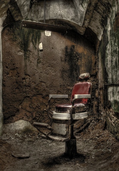 abandoned barber chair